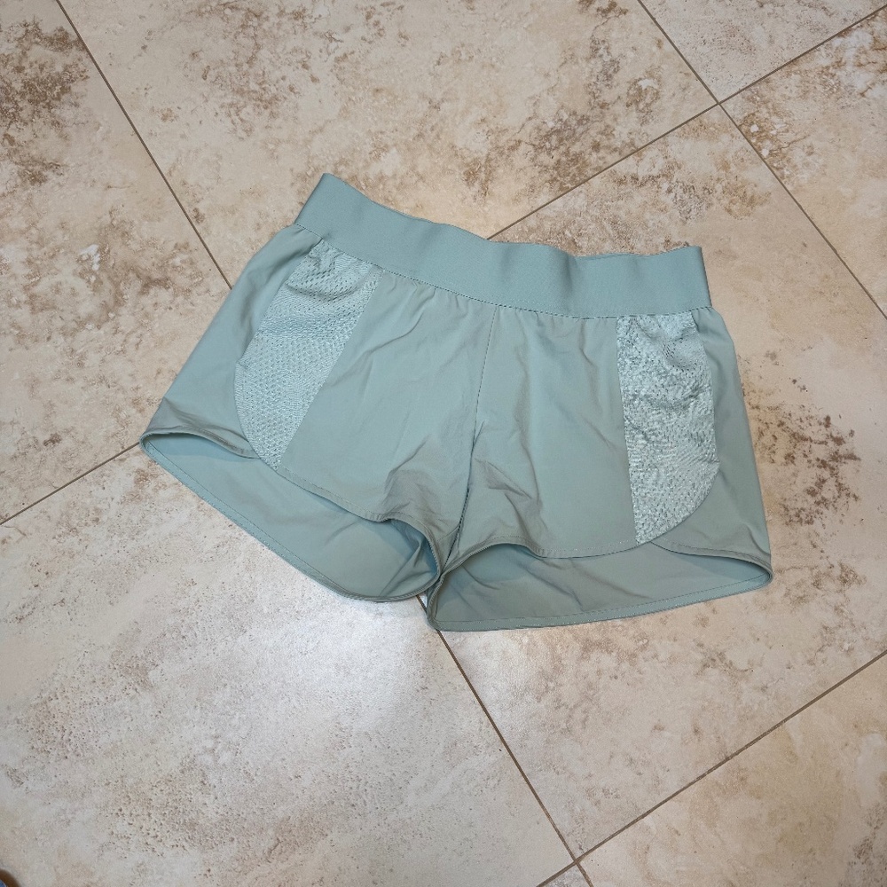 adidas light blue/teal short, medium, great condition